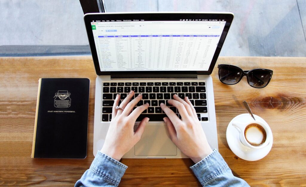 Minimalist Notion for mindful productivity on a laptop screen, clean layout with only a few icons, soft natural lighting.