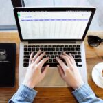 Minimalist Notion for mindful productivity on a laptop screen, clean layout with only a few icons, soft natural lighting.